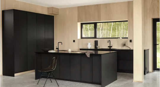 black granite kitchen countertop and black color cabinets