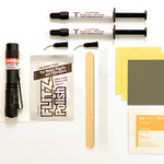 Collection of surface restoration tools and materials on a white background